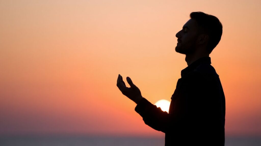 Homem orando ao pôr do sol representando Isaías dizendo envia-me a mim